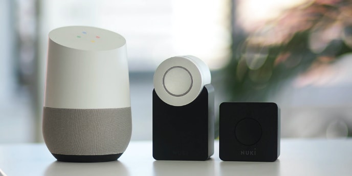 three smart speakers on a table