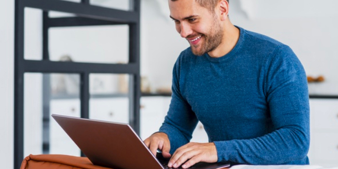 young man working with a computer