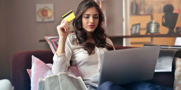 young girl making an online payment