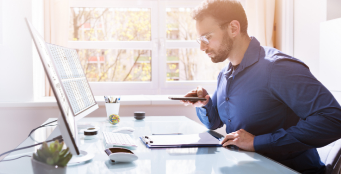 man scanning documents